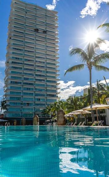 Icon Vallarta tower next to its pool in Puerto Vallarta’s North Hotel Zone
