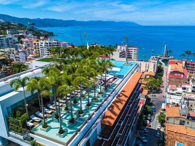 Rooftop bar with infinity pool at Pier 57 facing the Los Muertos Pier in Puerto Vallarta